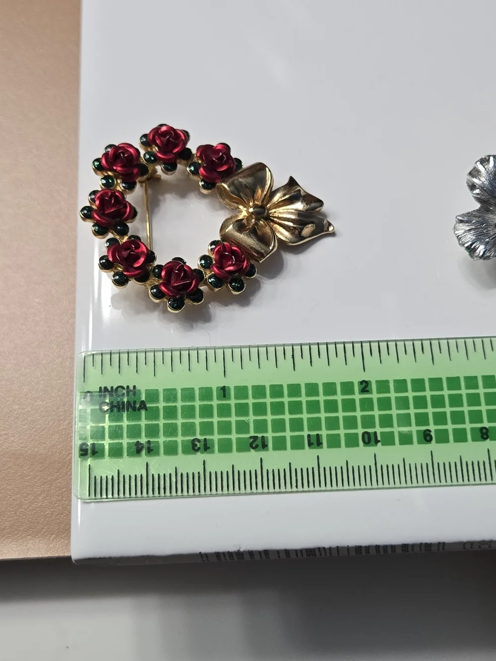 Avon Gold Bow Wreath Brooch with Red Roses and Green Accents